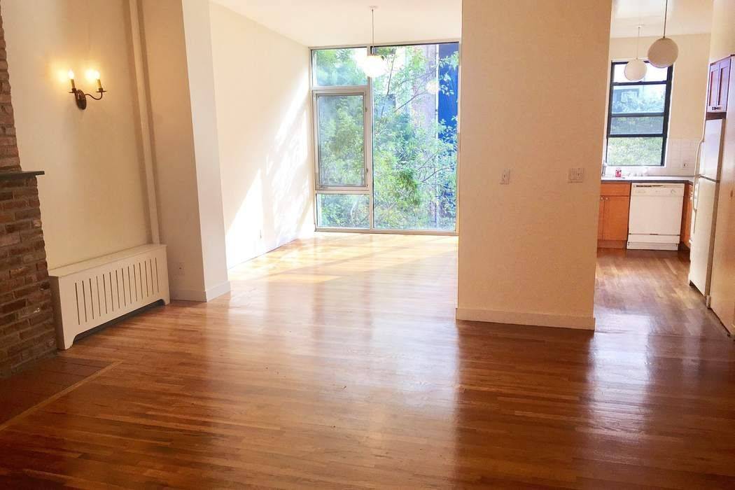 Absolutely stunning two bedroom two bath entire floor through apartment in owner occupied townhouse This beautiful apartment features a wood burning fireplace amazing light from the north and the south, ...