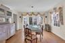 Dining room featuring french doors and light wood-style floors