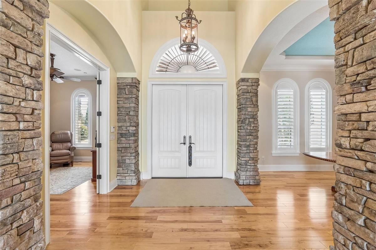 Foyer with Stacked Stone Pilars