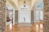 Foyer with Stacked Stone Pilars