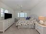 The third bedroom is large and features a walk in closet