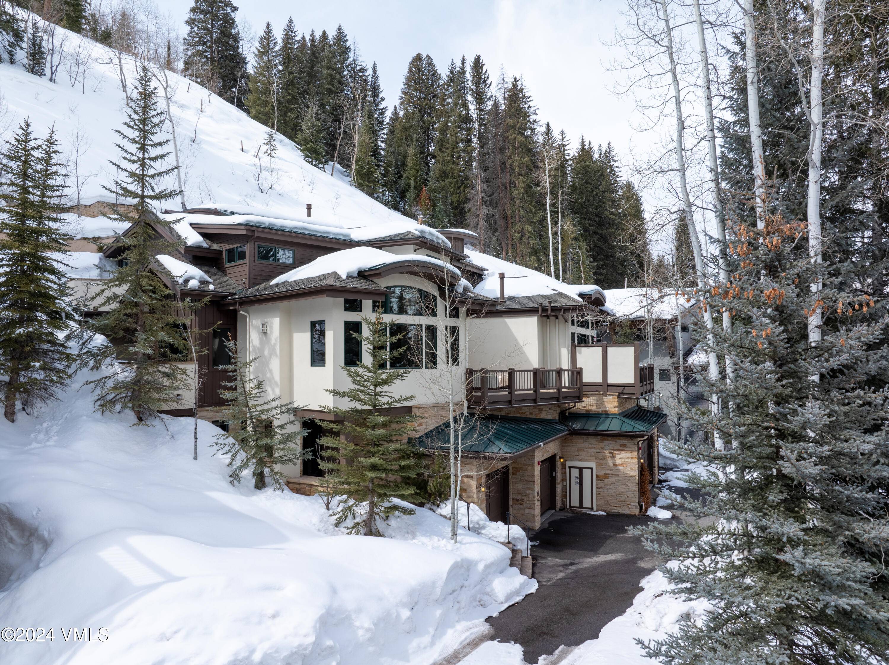 Extensive interior updates transform this unique duplex home into a fresh, bright, sophisticated mountain sanctuary nestled in the charming rustic neighborhood of East Vail.
