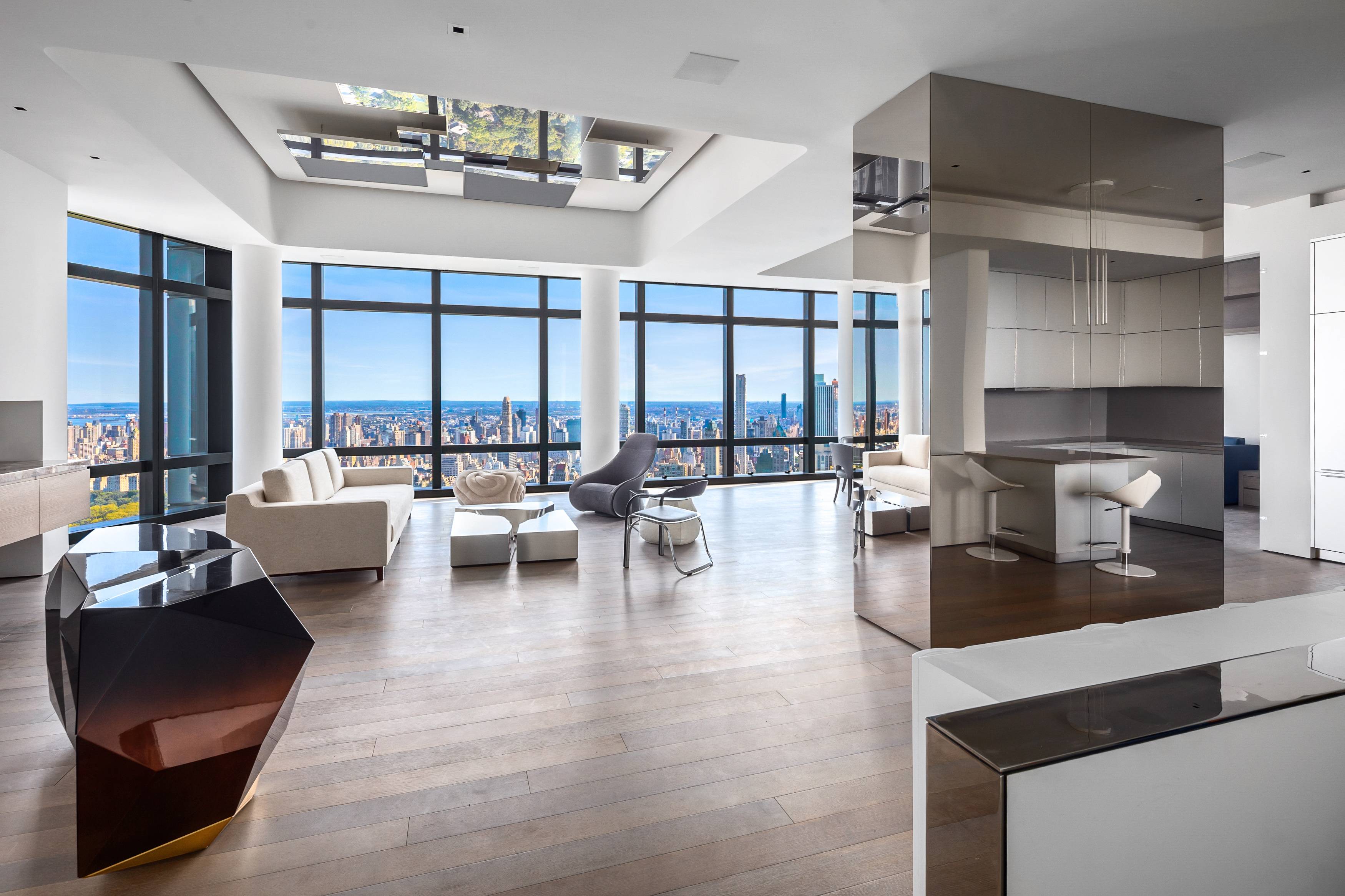 With commanding views across Central Park and up the Hudson River, this custom built, 4 bedroom, 4.