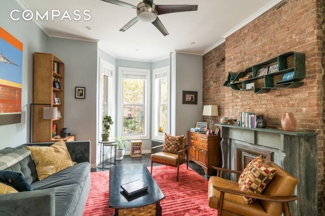 Welcome home to this open plan boutique condo with a custom designed reclaimed wood dining table perfect for work from home, all finished off by high ceilings, exposed brick, recessed ...
