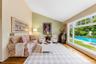 formal living room overlooking sparkling pool