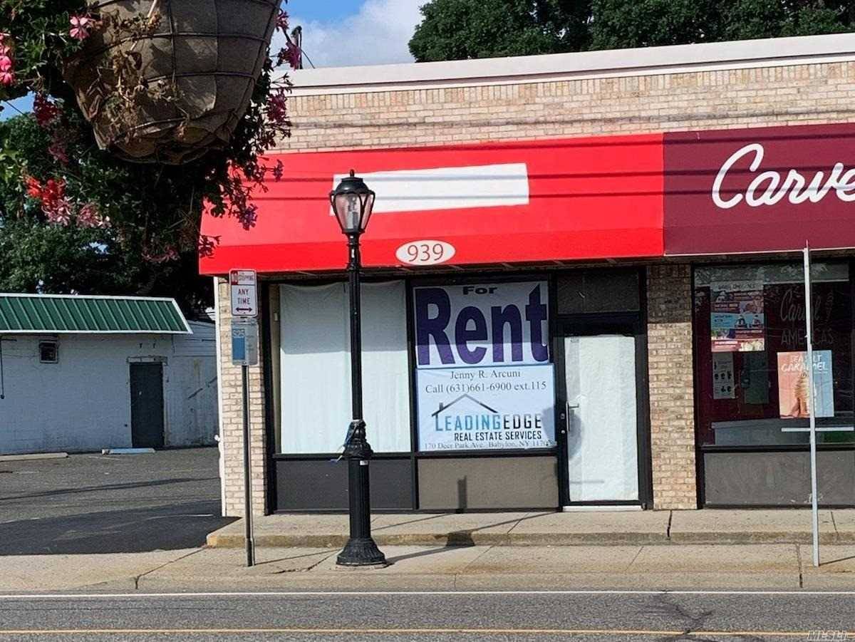 Corner Space Located in Small Strip of Stores with Plenty of Parking and Great Visibility !