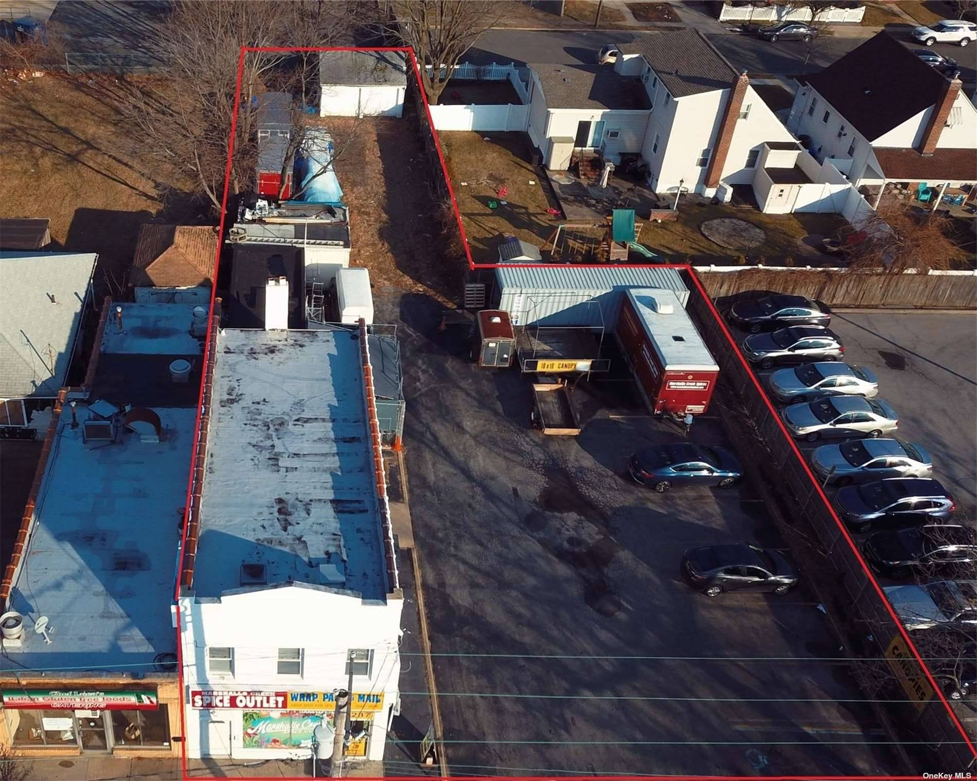 3237 Long Beach Road Oceanside NY 11572 Mixed use building with approximately 1480SF ground level retail space, and a 2 bedroom 1, 000 SF residential apartment on the second floor.
