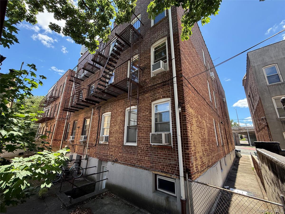 Semi-Detached BRICK SIX FAMILY...walk out access from basement