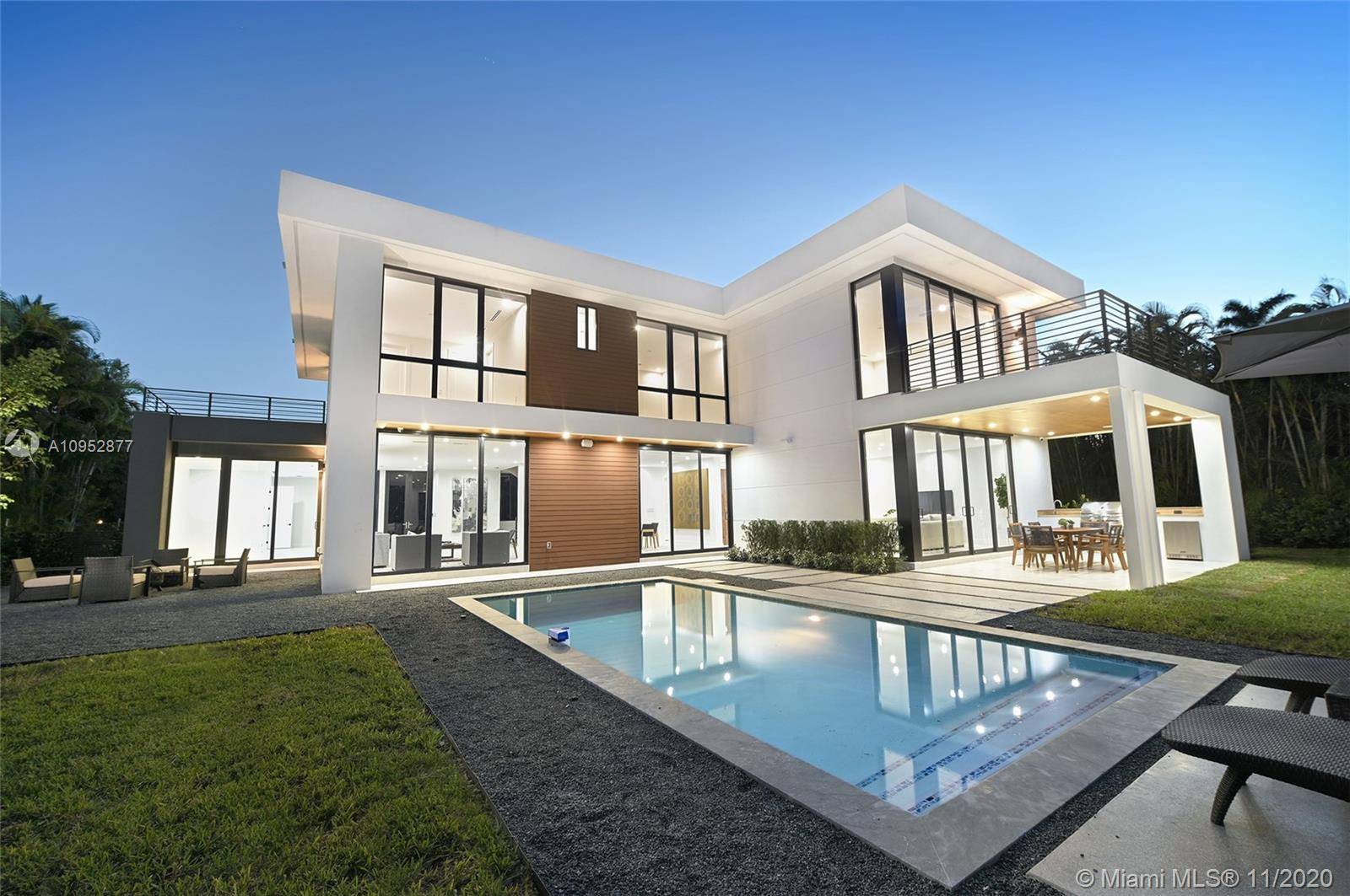This warm architectural contemporary home is set in the hotbed of South Miami.