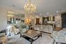 Family room featuring crown molding