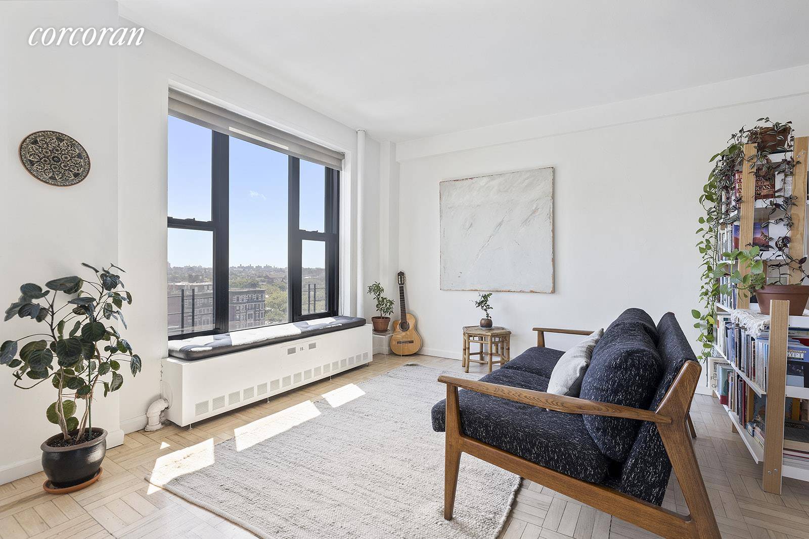 This extra large co op home has expansive views of Brownstone Brooklyn from all five oversized windows !