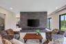 Extended feature wall, tiled on both sides.