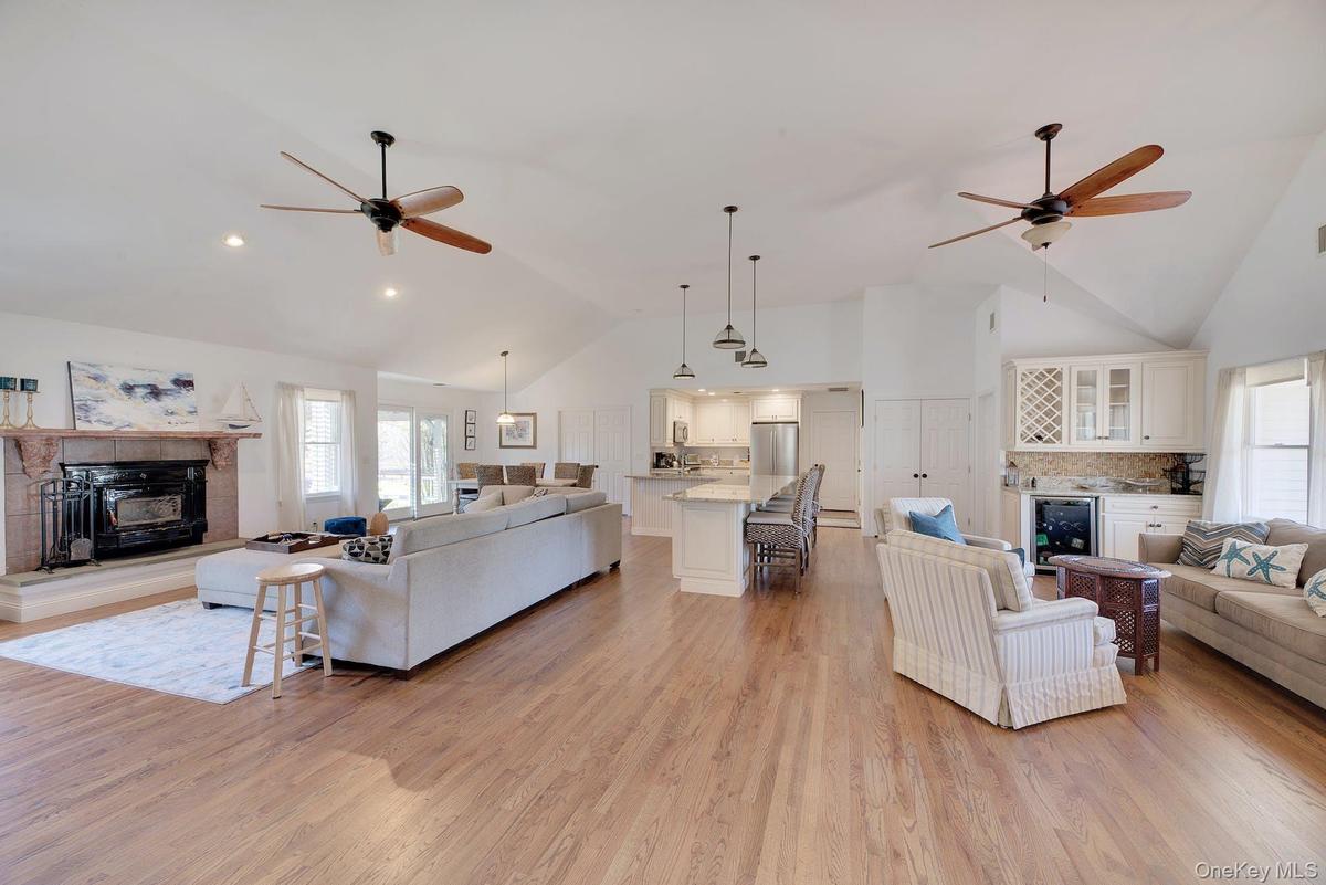 Living Room, Kitchen and Den with Wine Bar and Fridge