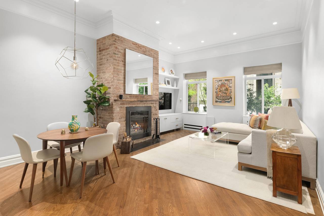 A stunning floor through home boasting high end finishes and a private sun terrace.