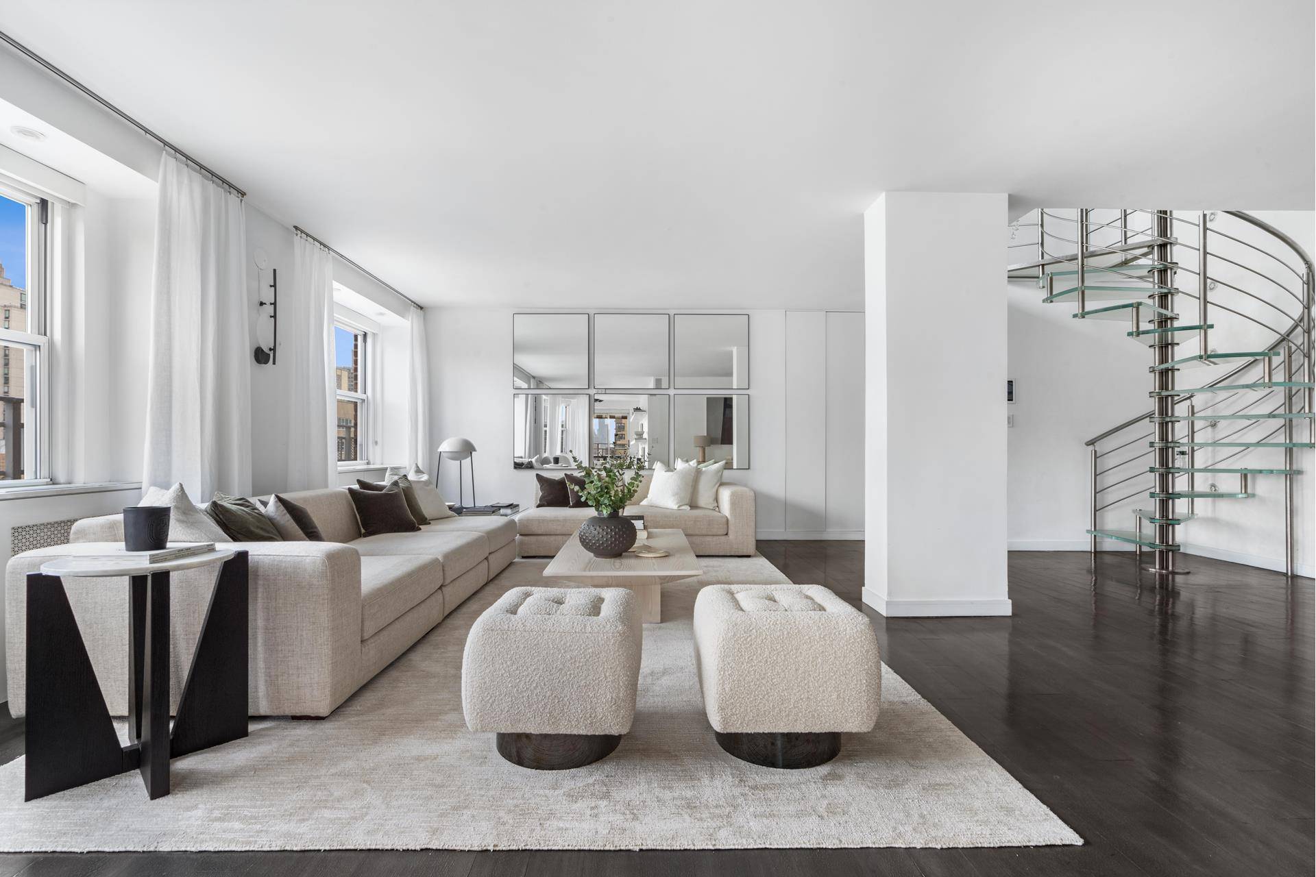 Incredible 6 bedroom, 6. 5 bathroom, duplex penthouse with a wraparound terrace available for sale in the Upper East Side.