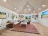The large 18 x 18 room can be used for additional office space or a quiet TV room away from the entry and entertaining areas.