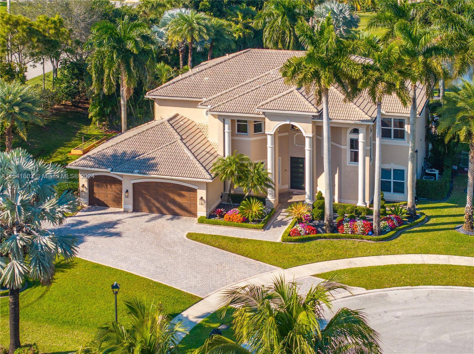 Experience luxury living in this stunning home situated in one of Davie's most exclusive gated communities.