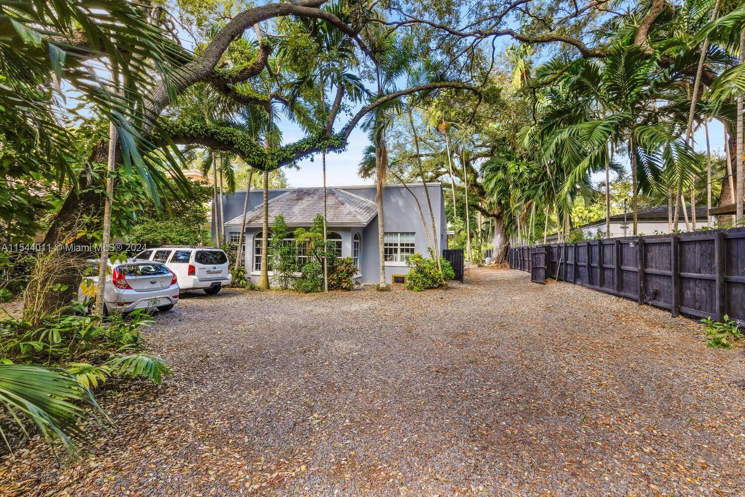 Live the Grove lifestyle on a captivating, tree canopied North Grove street just a short walk or bike ride to bayfront parks marinas.