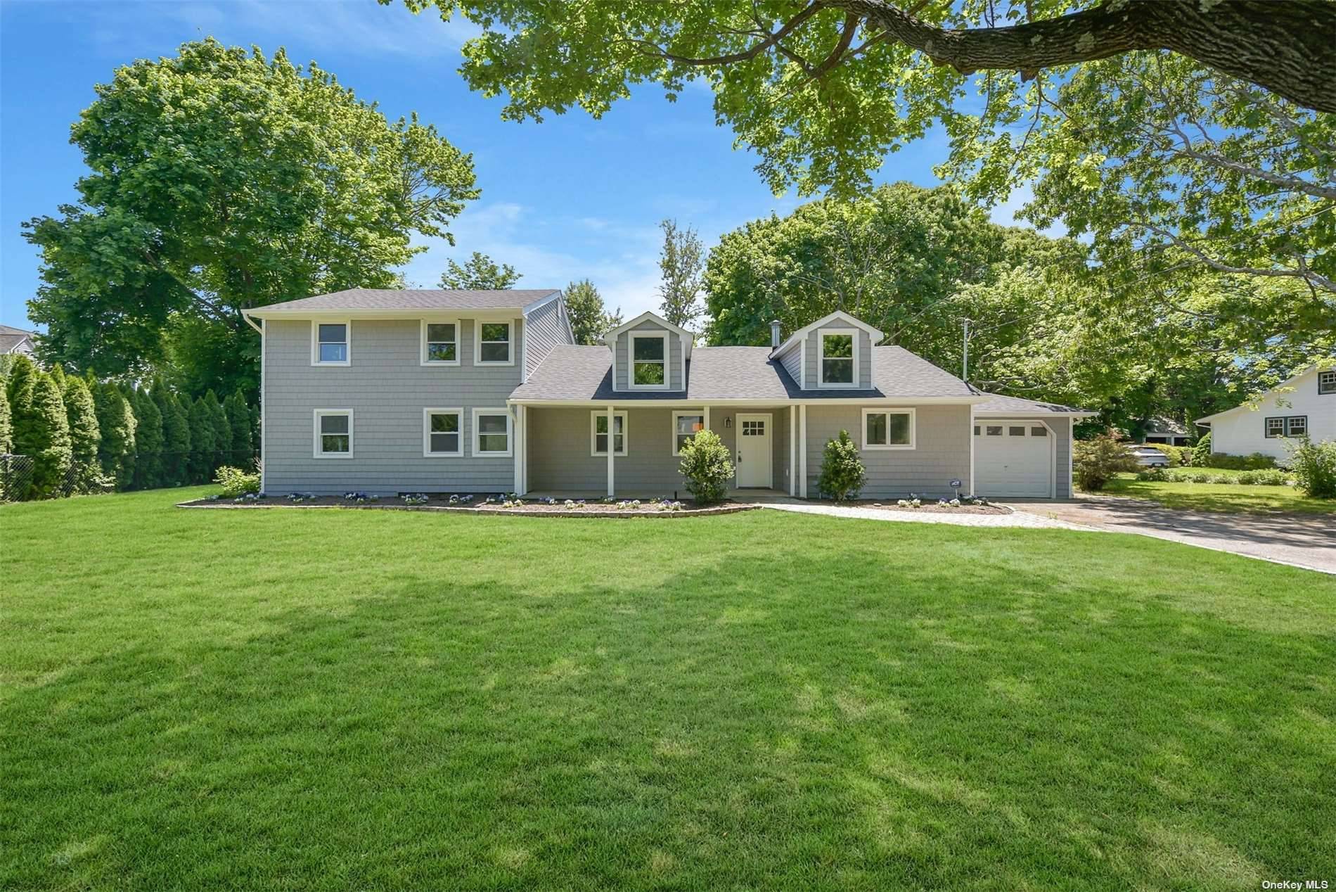Move right into this completely renovated, turn key Southold Village home close to town and all the best Peconic Bay beaches !