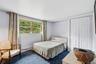 2nd Bedroom with Carpeting and Double Closet