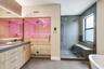 Wall to wall mirror with light strips. Custom built in Sauna.
