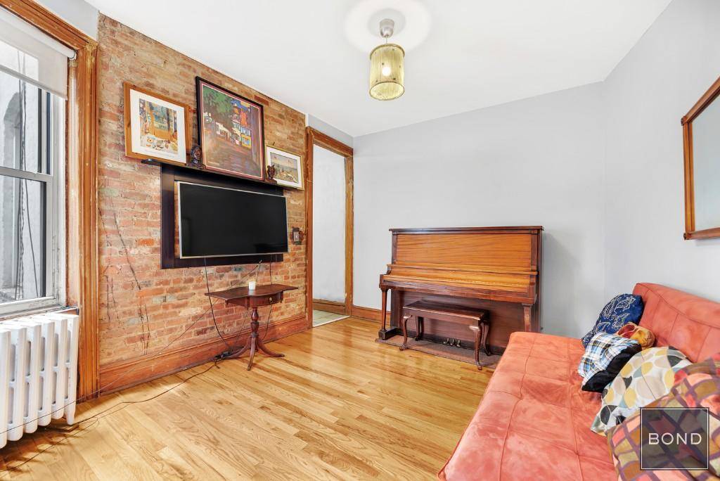 The creative character of the East Village is preserved in this terrific 2 Bedroom, 1 Bathroom coop on East 4th Street between First and Second Avenues.