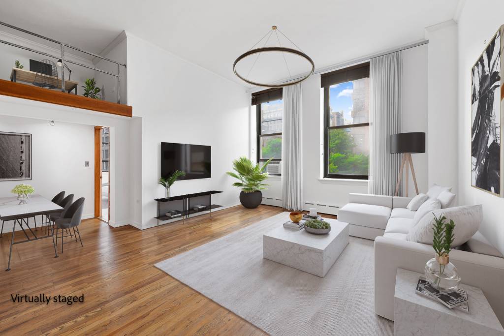 Spacious and bright renovated unique lofted true one bedroom apartment in highly desirable and sought after full service building in Greenwich Village.