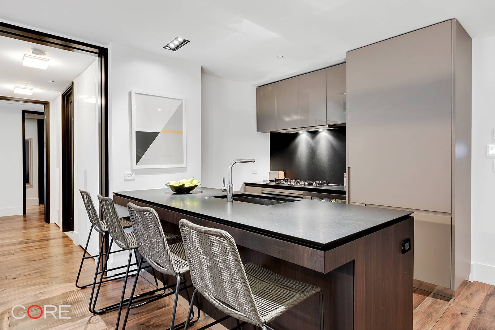 Unit 702 is a highly coveted, south facing, two bedroom residence that boasts oversized modern French doors and overlooks Chelsea s famous landmark carriage houses.