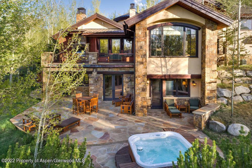 You'll feel as if you are on top of the world in this special home located in the Divide overlooking beautiful Snowmass Village.