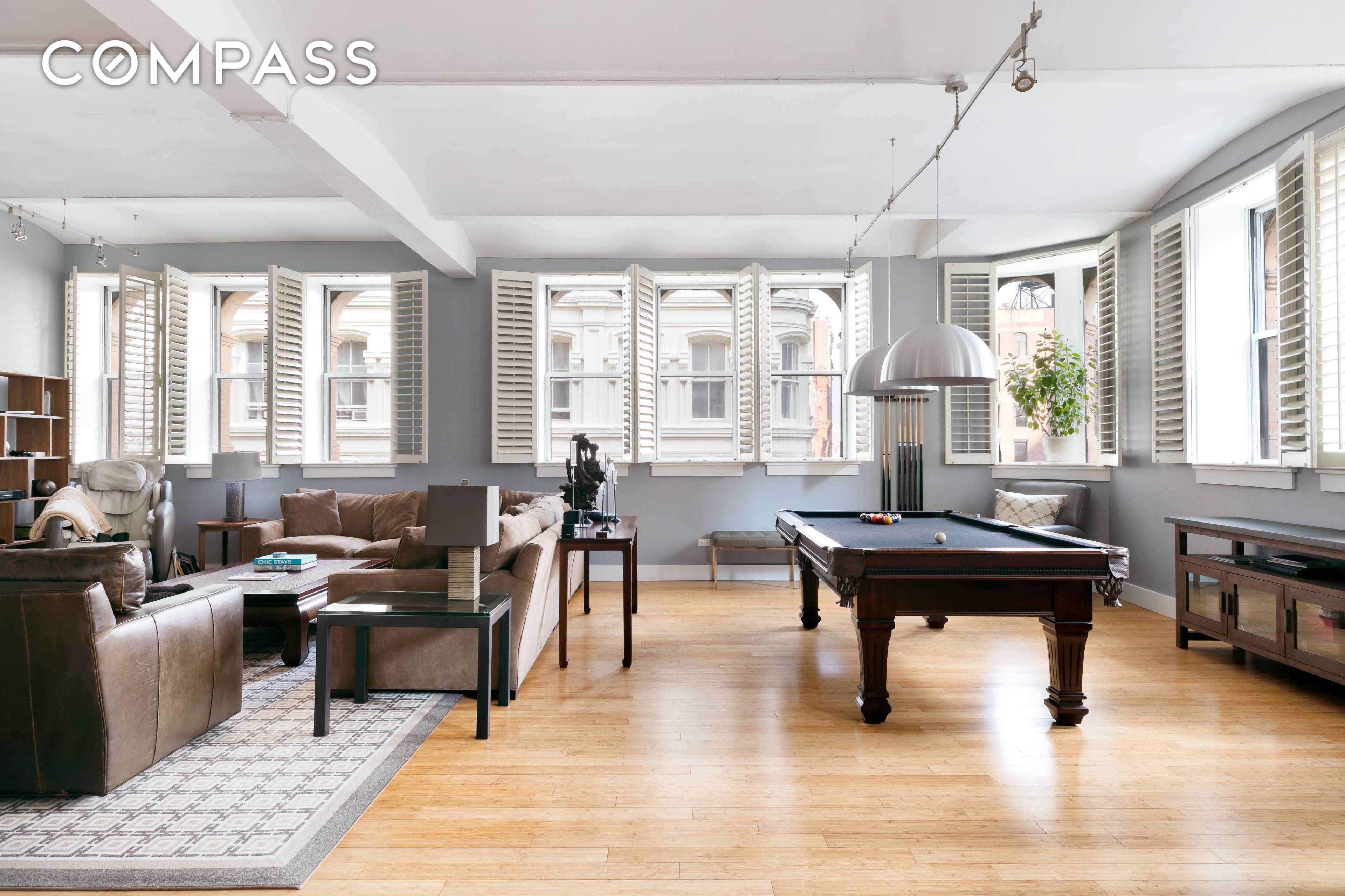 Featuring 23 windows and 12 foot barrel vaulted ceilings, apartment 9B is an immaculate half floor loft in a turn of the century landmarked condo conversion.