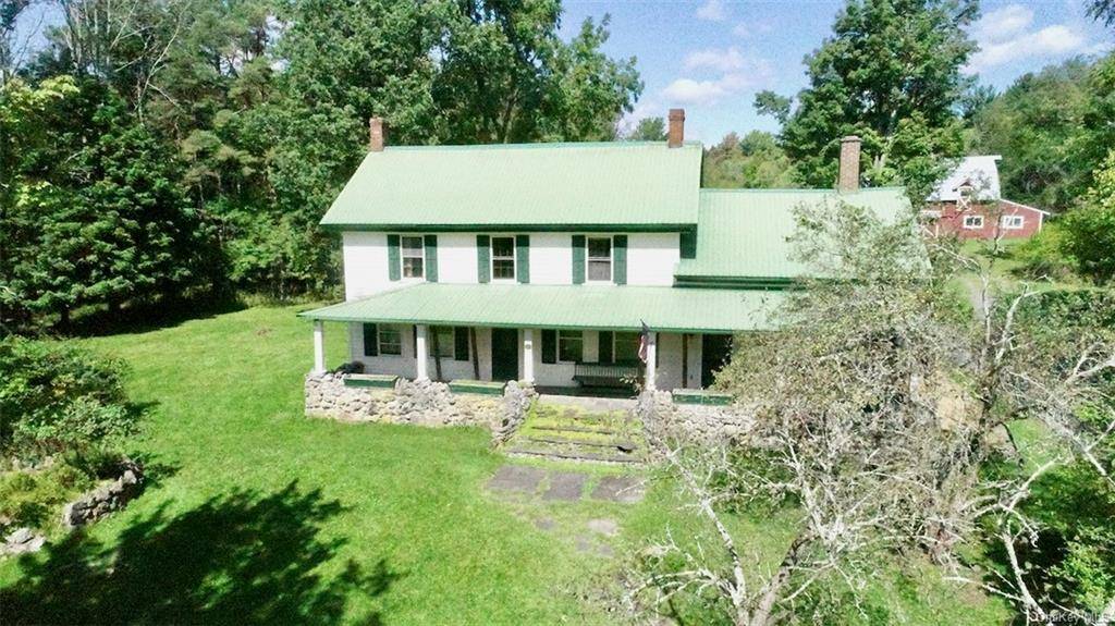 Fabulous 16 acre Farmhouse property located right off exit 106.