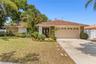 Spacious 4-bedroom Dunedin home on a cul-de-sac with no HOA, fresh updates, and a prime high-and-dry location close to downtown and the beaches.