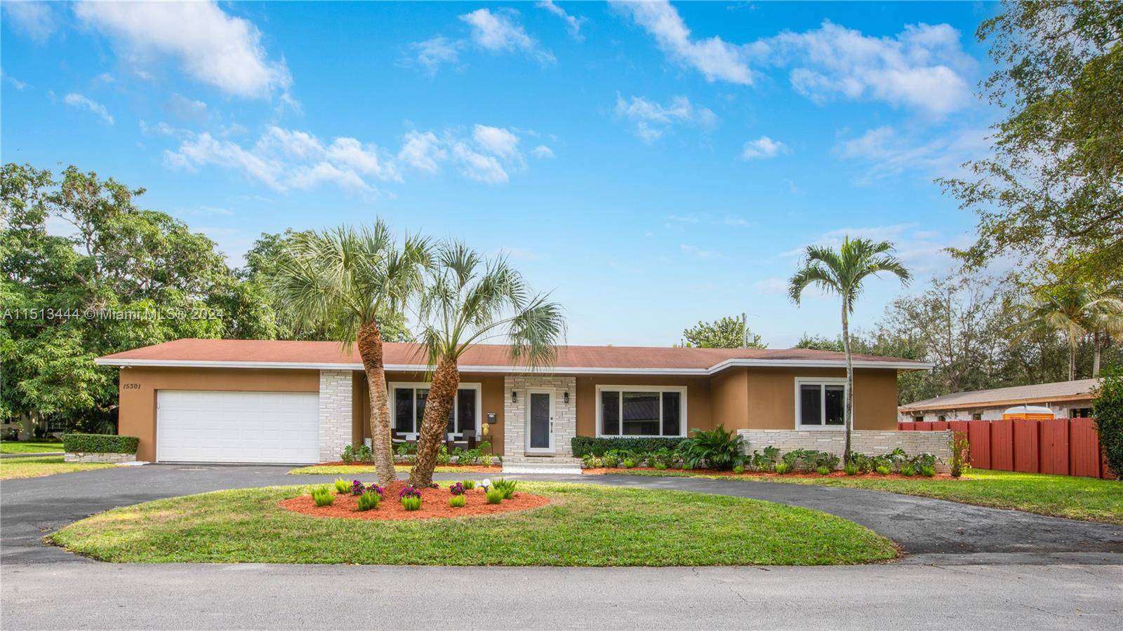 Welcome to your dream home in the serene community of Palmetto Bay.