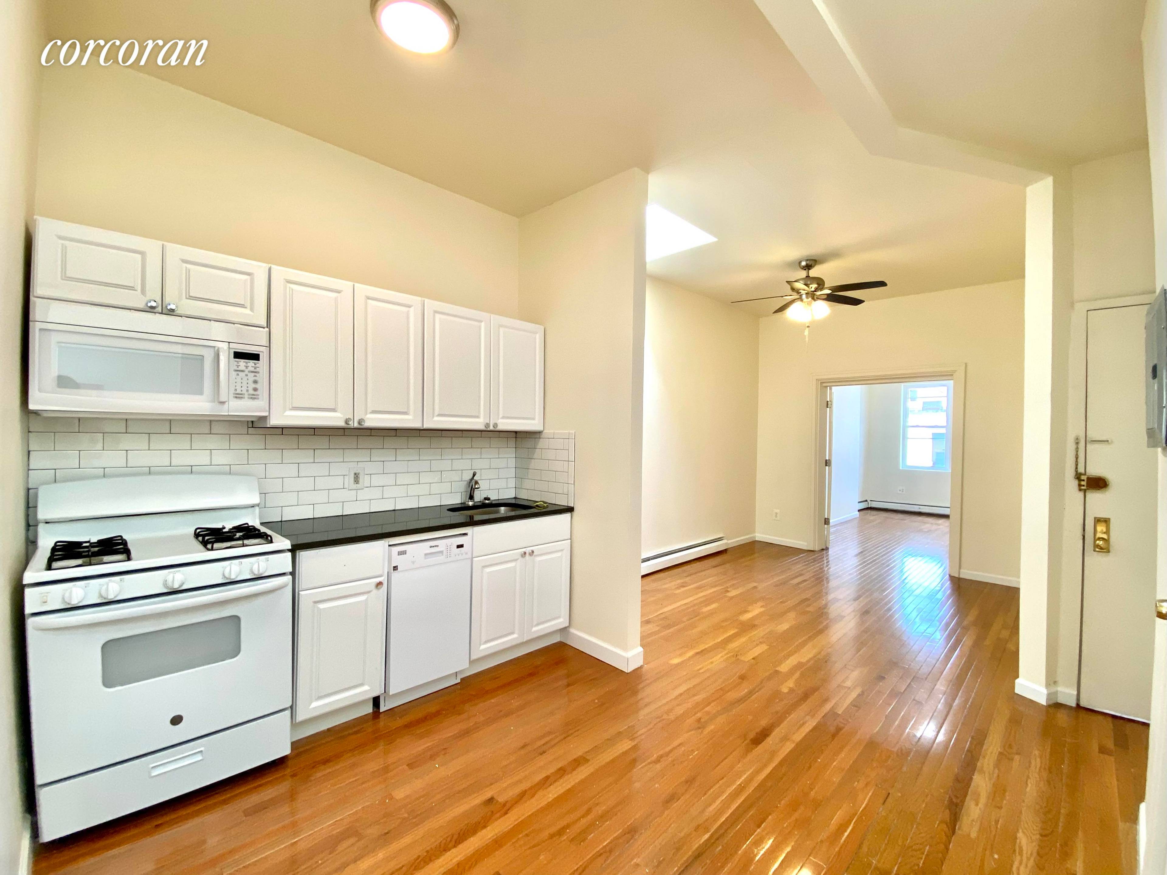 Beautiful Newly Renovated 3 bedrooms 6 rooms apartment featuring hardwood floors, kitchen with new appliances, microwave, dishwasher, high ceilings, lots of natural listings, skylight.
