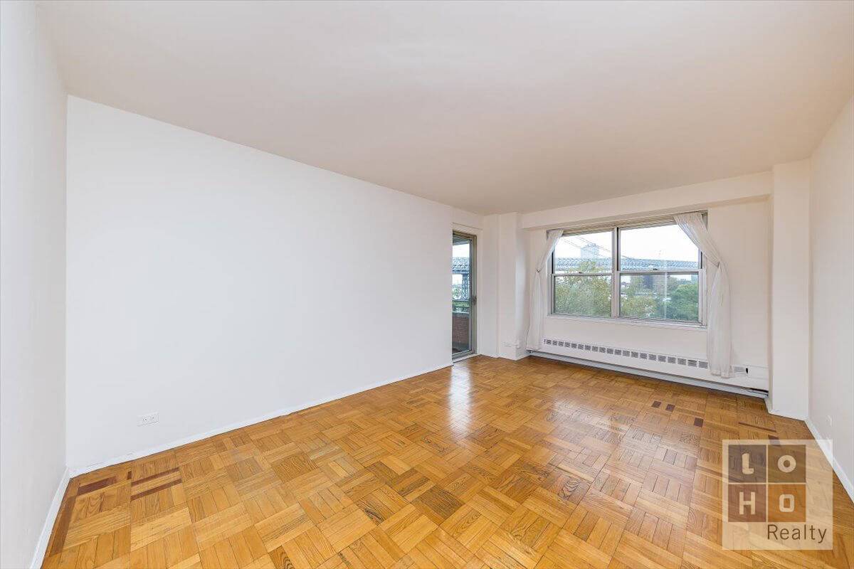 Renovated one bedroom with balcony apartment featuring beautiful sunrises and fantastic views of the East River amp ; Williamsburg Bridge all year round !