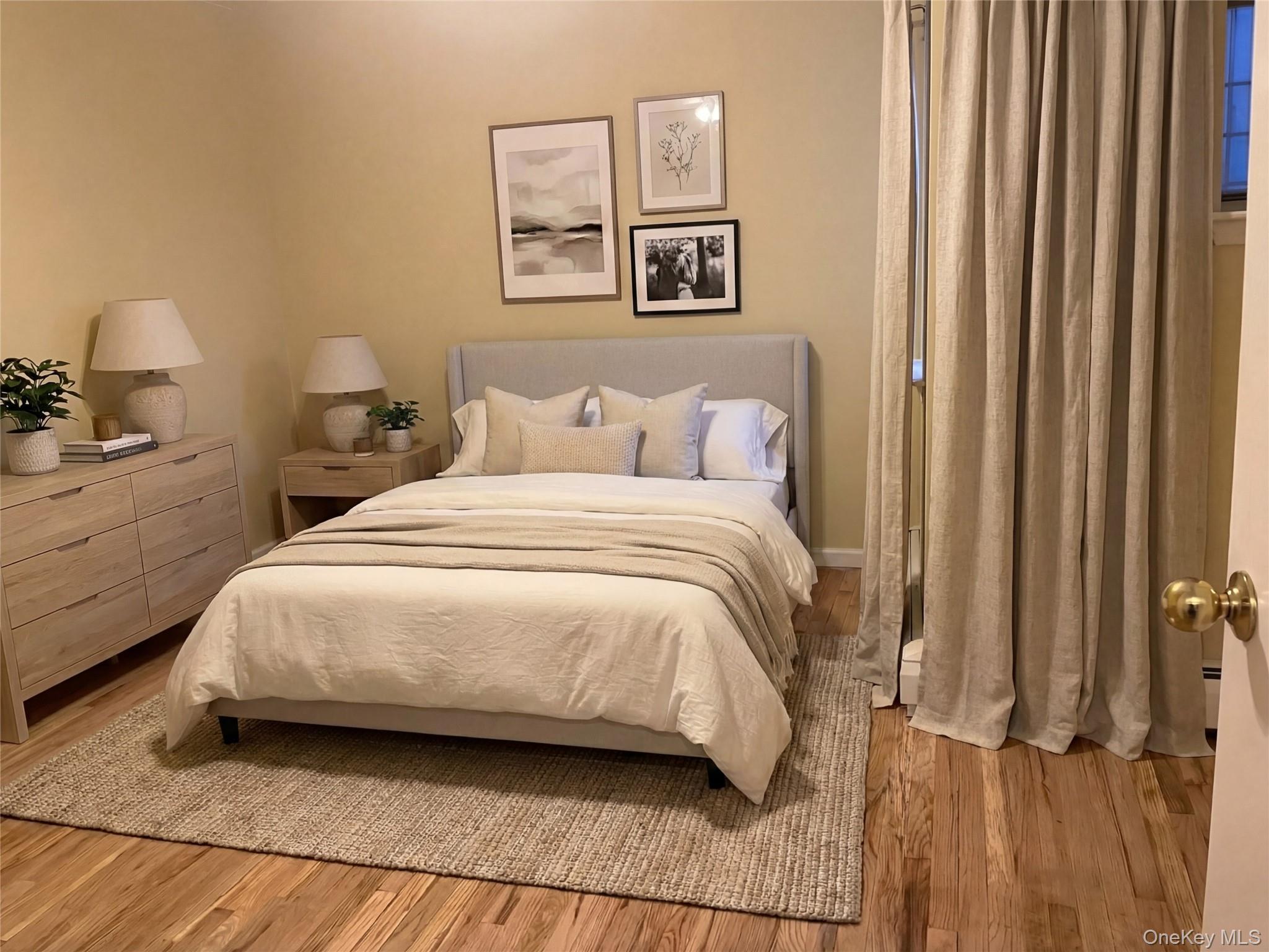 Very spacious bedroom. hardwood flooring. Clothes closets