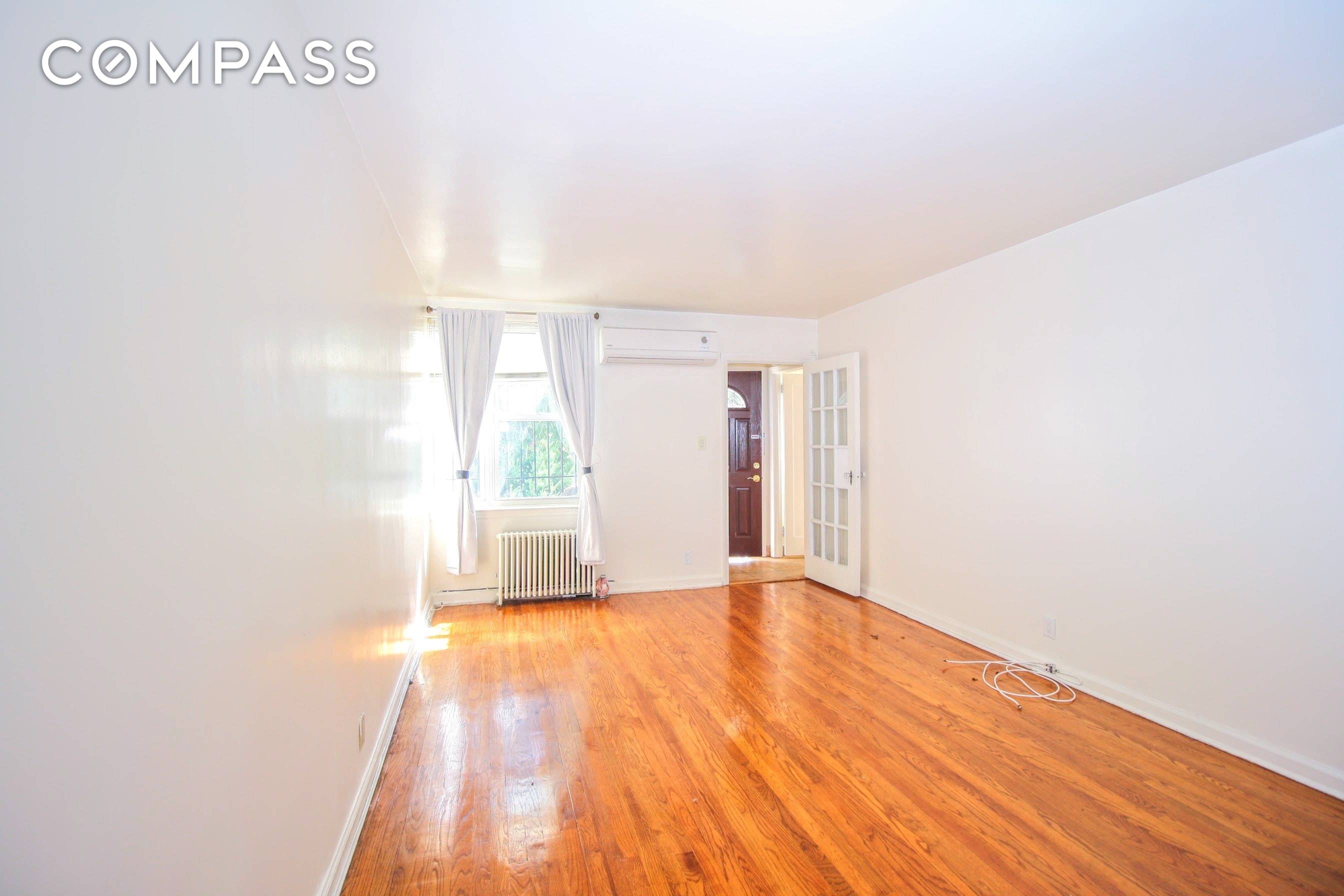 Beautiful full floor 2 bedroom on a quiet, tree lined street with 2 private patios in Sunnyside.