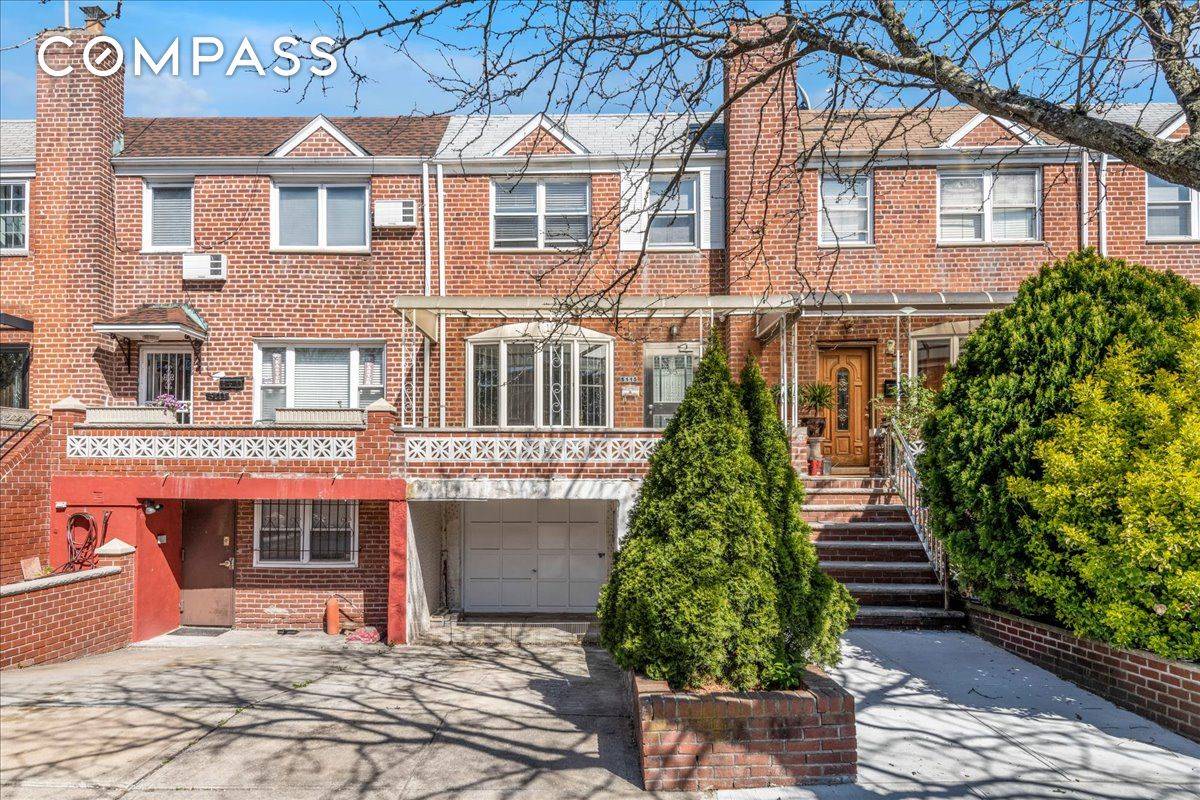 Charming attached brick townhouse located in a quiet tree lined Woodside neighborhood.