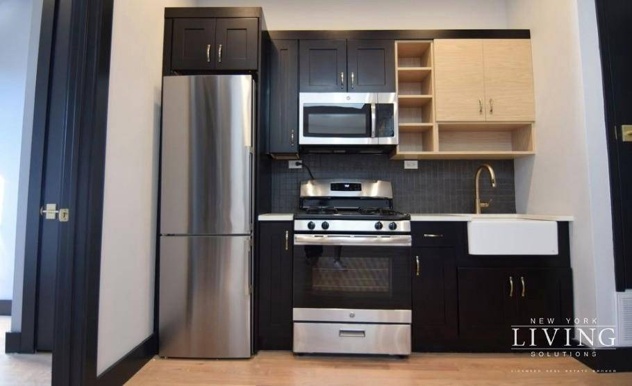 This gorgeous apartment features modern and sleek finishes throughout and is located on a quiet tree lined block in Ridgewood.