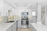 Kitchen Opens to Living Areas and Ocean Views