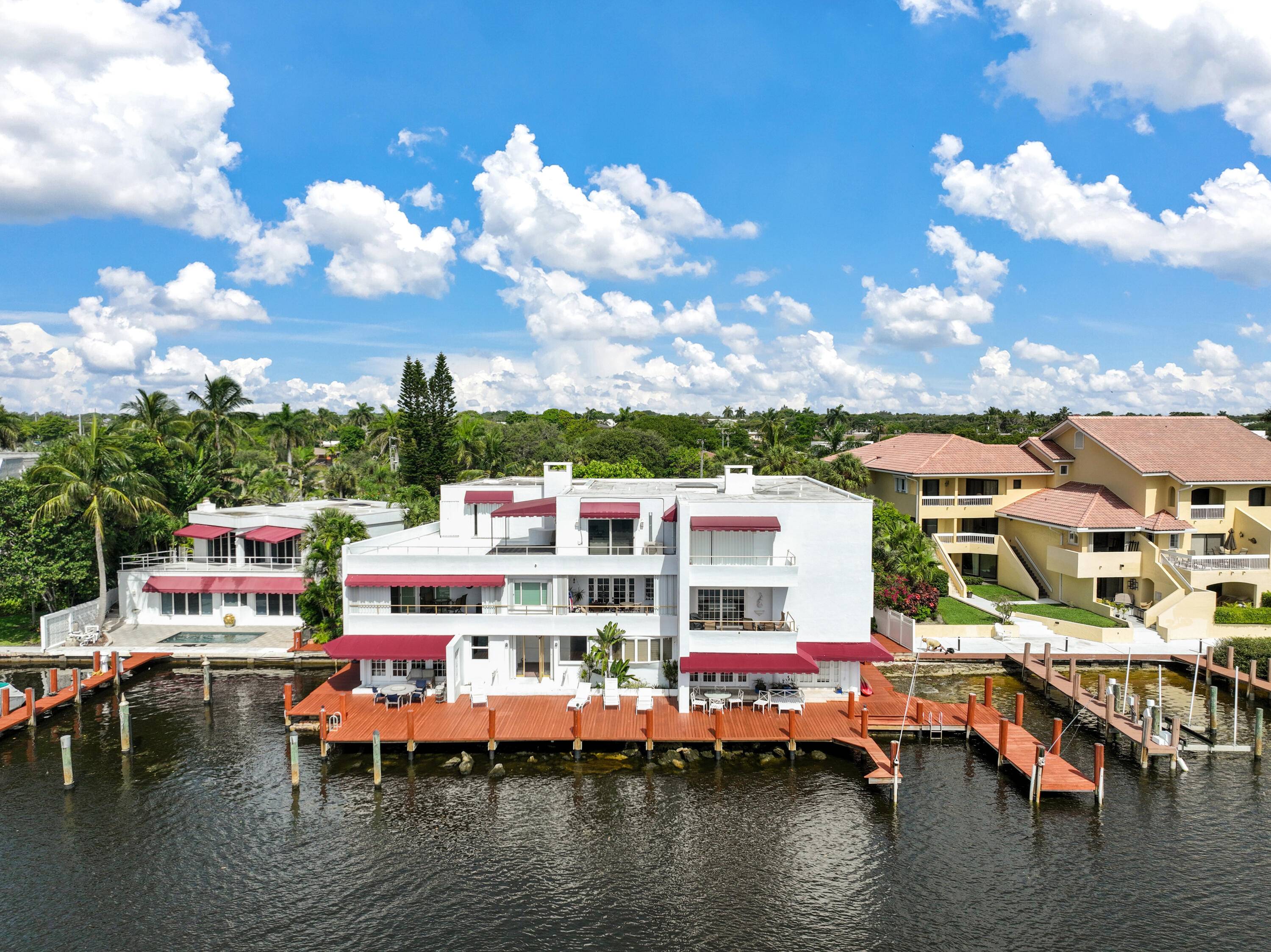 Amazing location for this very private and large one bedroom condo with a den on the intracoastal in coveted East Delray Beach.