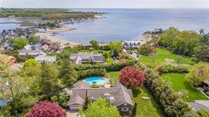 Furnished Yearly Rental with dramatic views of the Long Island Sound and pool at one of the areas premier addresses Steps To Compo Beach and Longshore Country Club.