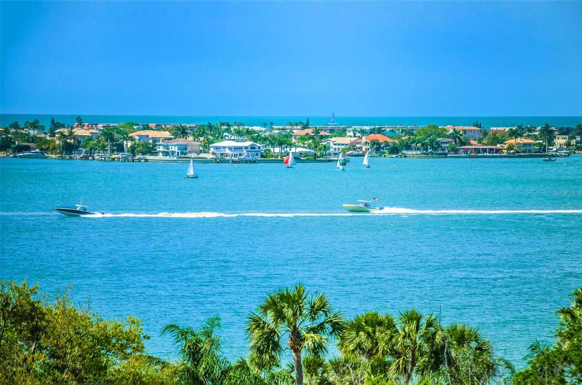Your Million Dollar Penthouse View to the Wesst from your 41 feet of windows. Watch the boats go by, savor the sunsets, or celebrate with 4th of July
