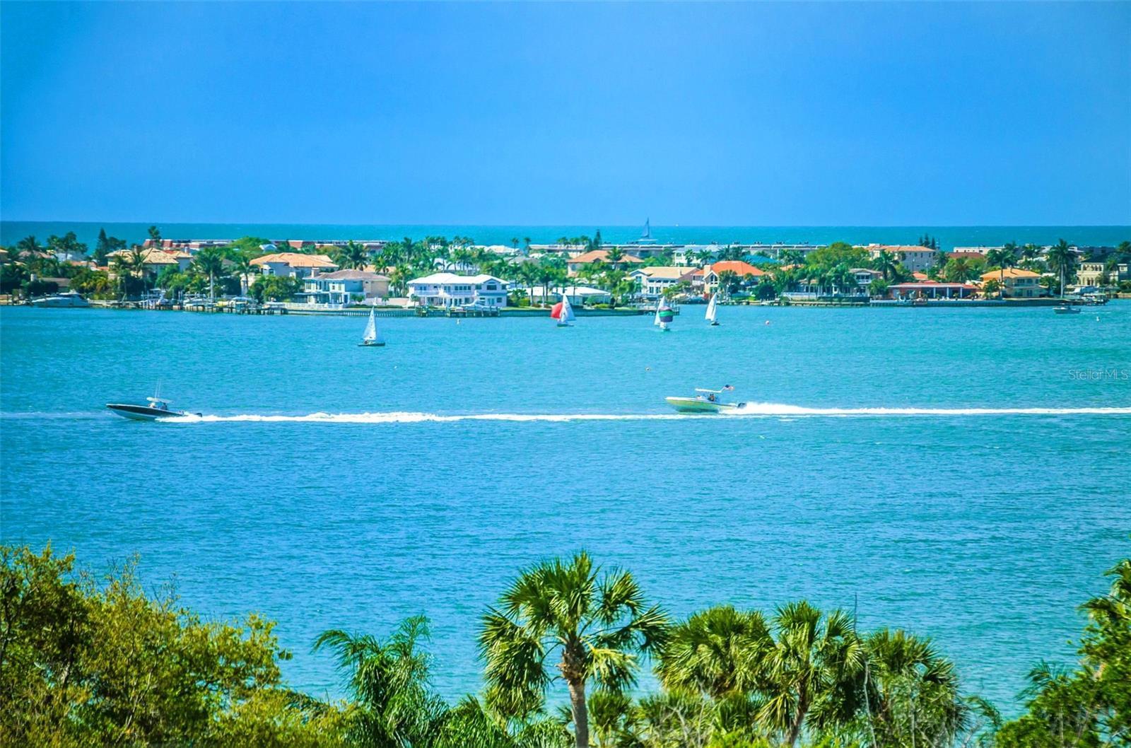 Your Million Dollar Penthouse View to the Wesst from your 41 feet of windows. Watch the boats go by, savor the sunsets, or celebrate with 4th of July