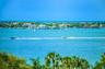 Your Million Dollar Penthouse View to the Wesst from your 41 feet of windows. Watch the boats go by, savor the sunsets, or celebrate with 4th of July