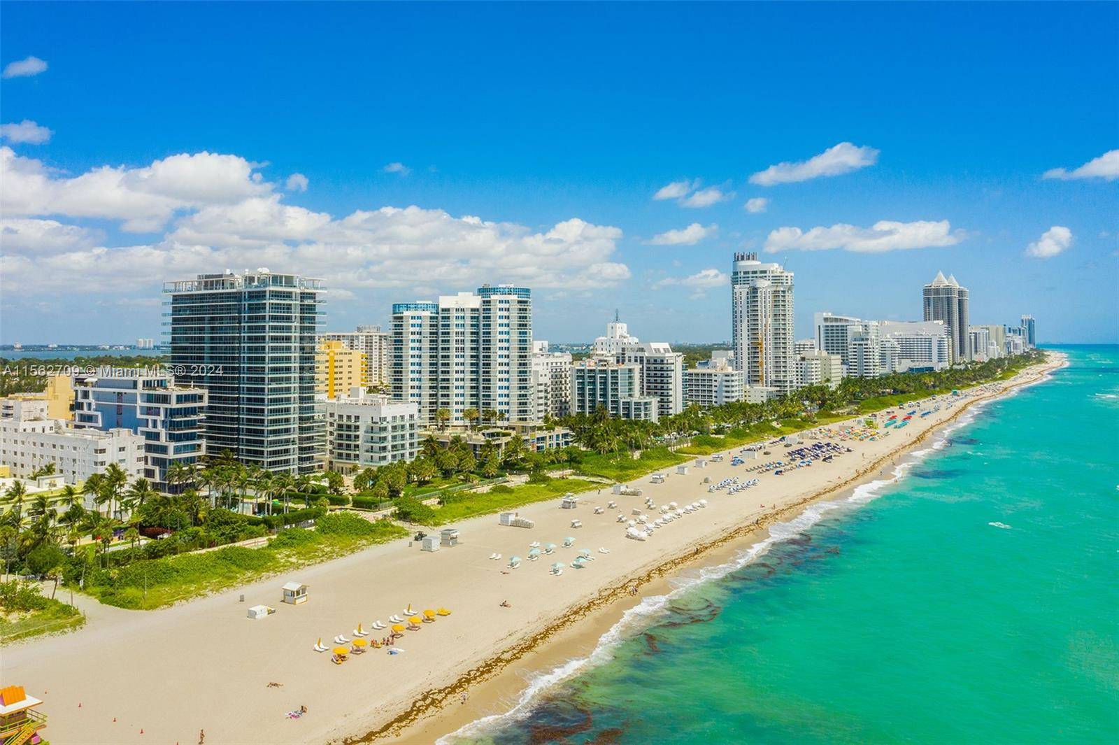 Indulge in quintessential Miami Beach living at this oceanfront gem with a corner flow through split floorplan, showcasing stunning ocean and downtown views.