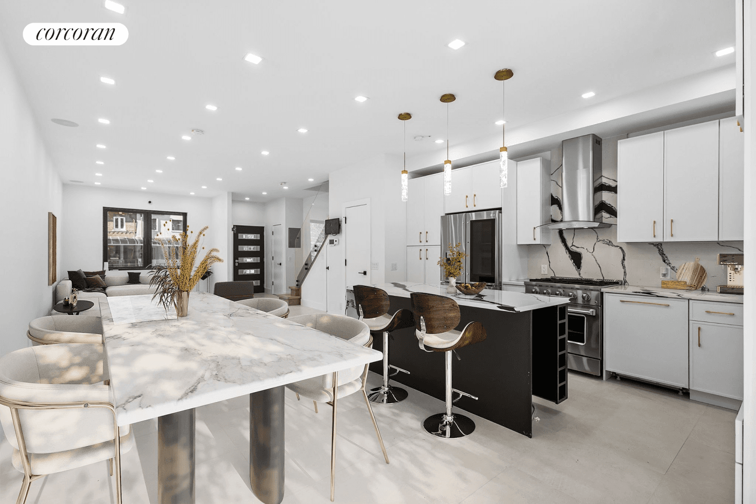 Introducing 125 Corbin Place an impeccably modern and renovated townhome that boasts a sleek design, a convenient driveway garage combo, and a private backyard retreat !