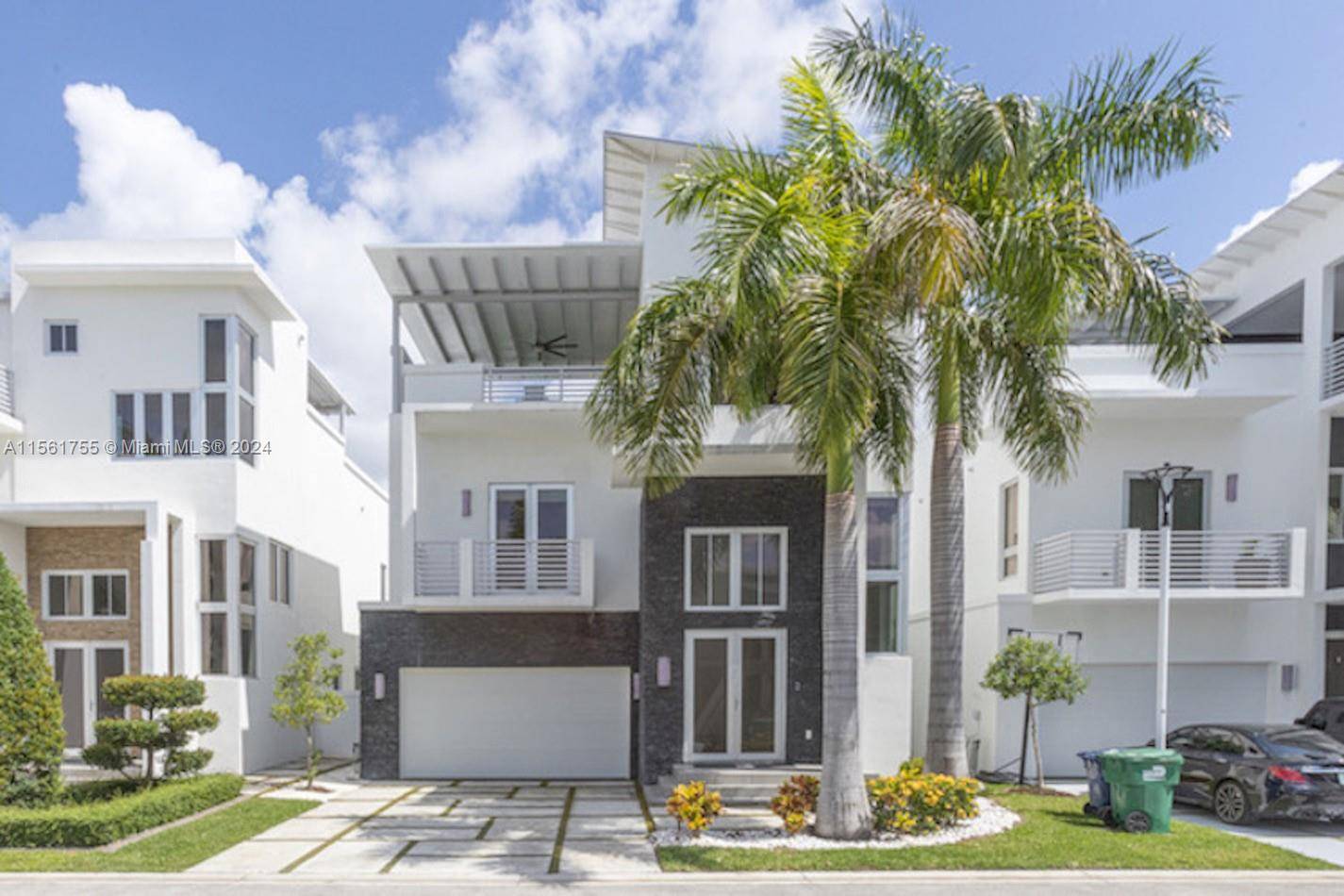 This is a beautiful, elegant, modern style home in the exclusive Community Oasis Park Square.