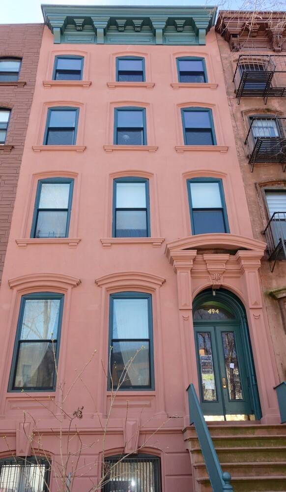 Three bedroom and one bath top floor apartment with skylights and in unit washer and dryer.