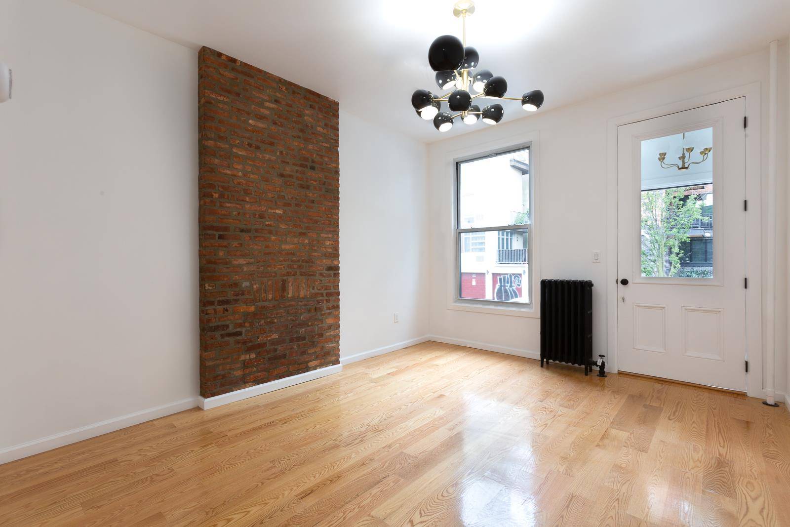 Welcome to 988 Willoughby Avenue, a recently renovated, two family townhouse in the heart of Bushwick.